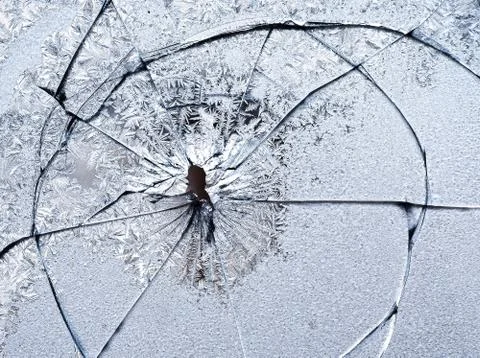 Frosty natural pattern on winter window, and broken, glass and Painting effect. Stock-Fotos