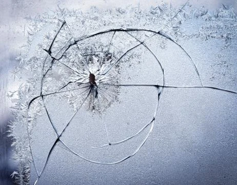 Frosty natural pattern on winter window, and broken, glass and Painting effect. Stockfoto's