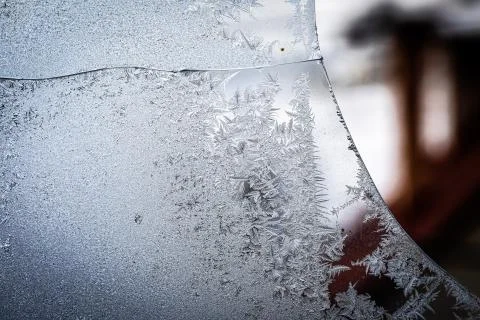 Frosty natural pattern on winter window, and broken, glass and Painting effect. Foto stock