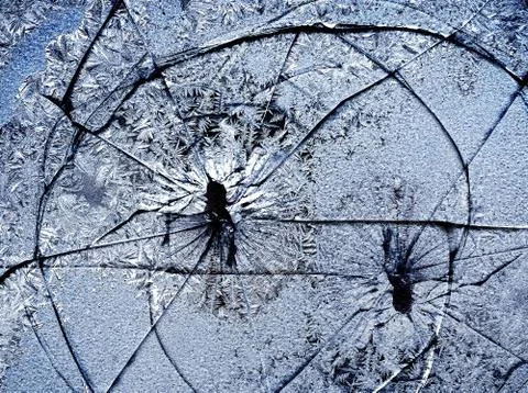 Frosty natural pattern on winter window, and broken, glass and Painting effect. Stockfoto's