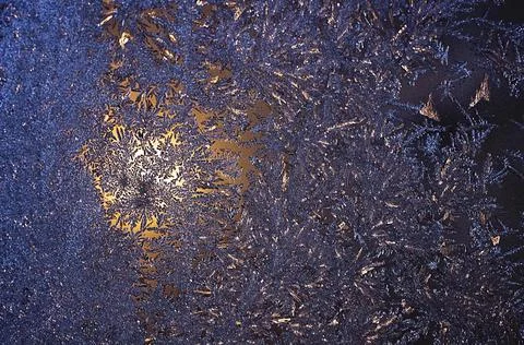 Frosty natural pattern on winter windowpane Stock Photos