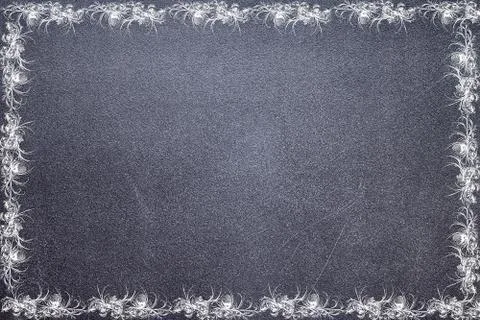 Frosty pattern on the chalkboard Stock Photos
