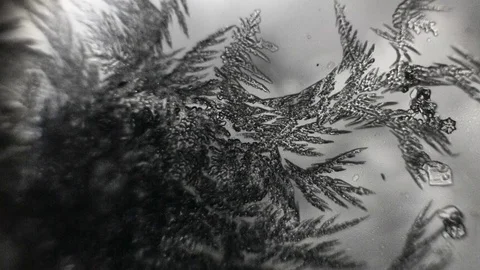 Frosty pattern on glass melts Video stock 72767968