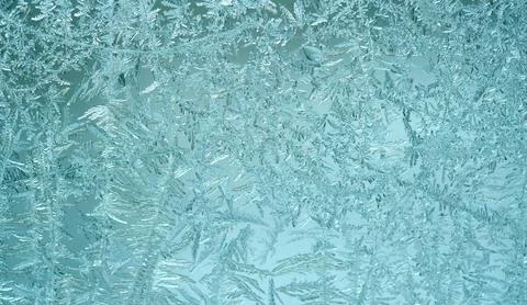 Frosty pattern on glass Stock Photos