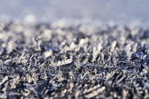 Frosty pattern on the surface in winter season Stock Photos
