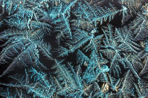 Frosty pattern on the window close-up. Winter background, texture 写真素材