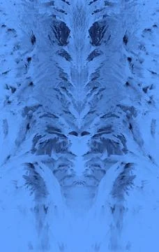 Frosty pattern on the window draws winter blue color 스톡 사진