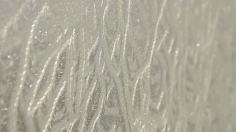 Frosty pattern at a window Stock Footage 100019986