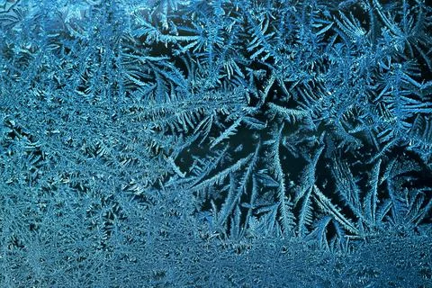 Frosty pattern on window glass Stock Photos