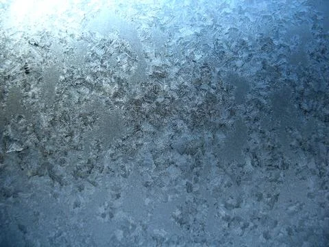 Frosty pattern on winter window Stock Photos