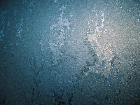 Frosty pattern on winter window Stock Photos