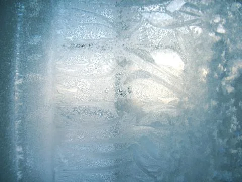 Frosty pattern on winter window Stock Photos