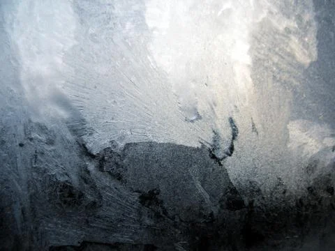 Frosty pattern on winter window Stock Photos