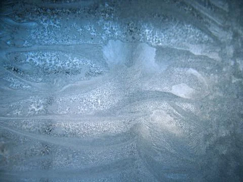 Frosty pattern on winter window Stock Photos