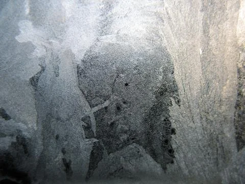 Frosty pattern on winter window Stock Photos