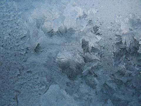 Frosty pattern on winter window Stock Photos