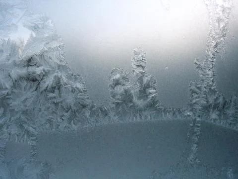 Frosty pattern on winter window Stock Photos