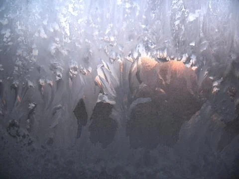 Frosty pattern on winter window Stock Photos