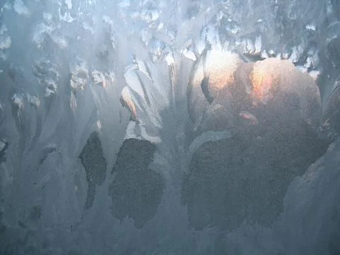 Frosty pattern on winter window Stock Photos