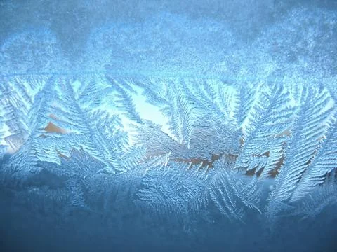 Frosty pattern on winter window Stock Photos
