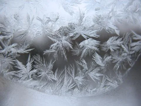 Frosty pattern on winter window Stock Photos