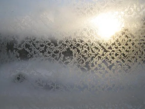 Frosty pattern on winter window Stock Photos