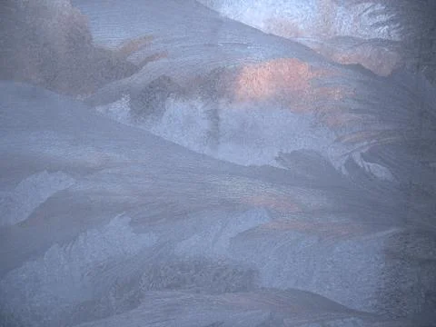 Frosty pattern on winter window Stock Photos