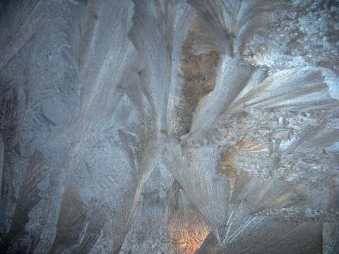 Frosty pattern on winter window Stock Photos