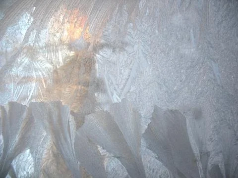 Frosty pattern on winter window Stock Photos