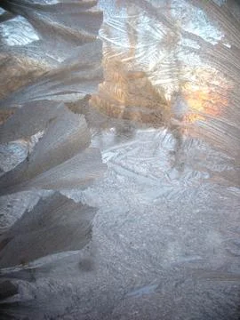 Frosty pattern on winter window Stock Photos