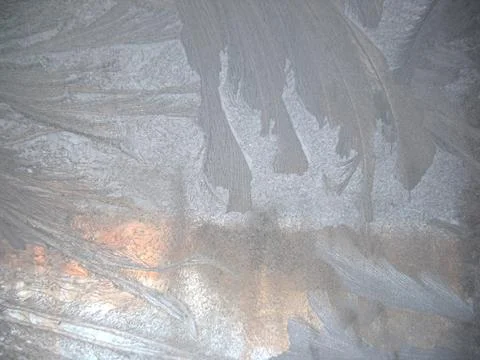 Frosty pattern on winter window Stock Photos