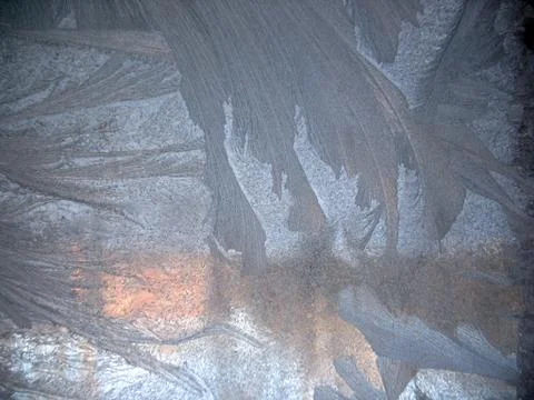 Frosty pattern on winter window Stock Photos