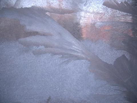 Frosty pattern on winter window Stock Photos