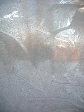 Frosty pattern on winter window Stock Photos