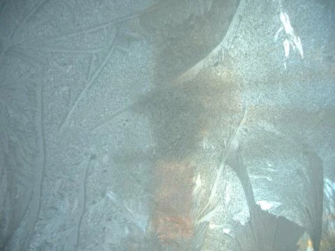 Frosty pattern on winter window Stock Photos