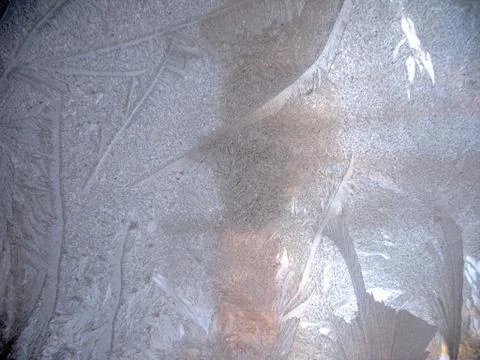 Frosty pattern on winter window Stock Photos