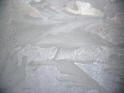 Frosty pattern on winter window Stock Photos