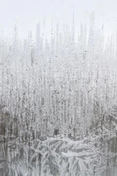 Frosty patterns on a frozen ice box in the early morning Stock Photos