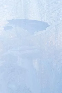 Frosty patterns on a frozen ice box in the early morning Stock Photos