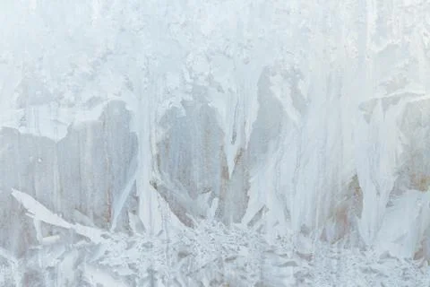 Frosty patterns on a frozen ice box in the early morning Stock Photos