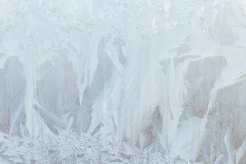 Frosty patterns on a frozen ice box in the early morning Stock Photos