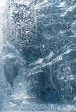 Frosty patterns on glass in winter Stock Photos