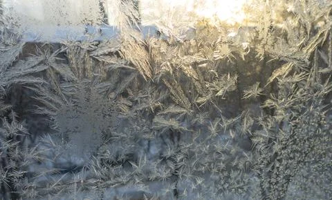 Frosty patterns on the windows 库存照片