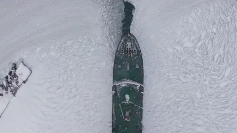 On a frosty winter day, the ship breaks the ice to enter the port. Stock-Footage 169979055