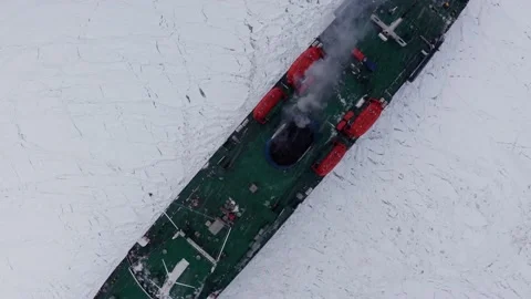 On a frosty winter day, the ship breaks the ice to enter the port. Stock Footage 169979367