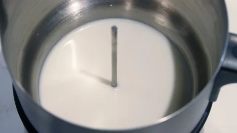 Froth milk slow motion Stock Footage 237886658