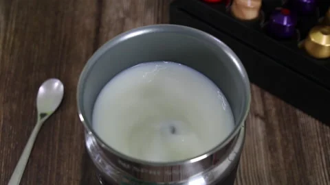 Frothing milk machine working Stock Footage 150600138