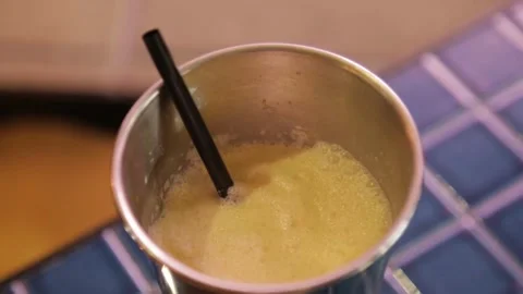 Frothy Blended Drink in Metal Cup with Straw on Cafe Counter, Sydney Australia Stock Footage 345691895