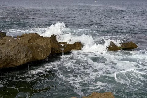 Frothy Coastal Waves in High-Speed Symphony Stock Photos