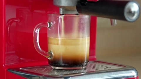 Frothy coffee in the coffee machine is an exciting visual effect, the process of Stock Footage 308790012